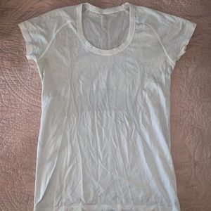 Lululemon white short sleeve athletic top. Size 10.